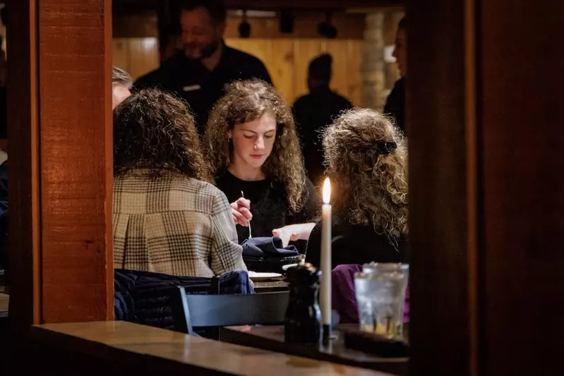 guests enjoying meal at The Peddler
