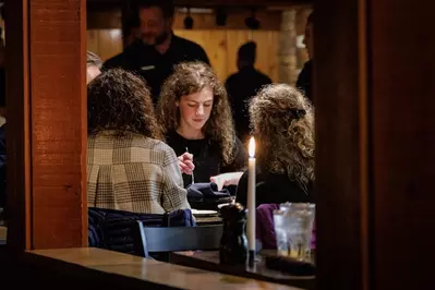 guests enjoying meal at The Peddler
